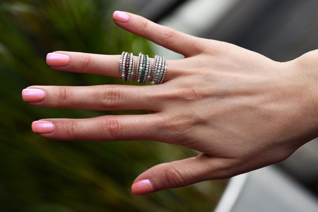 engagement rings on a woman's finger