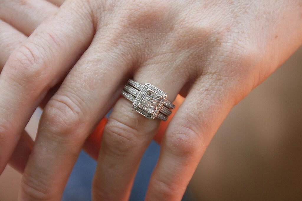 Pave ring on a woman's finger