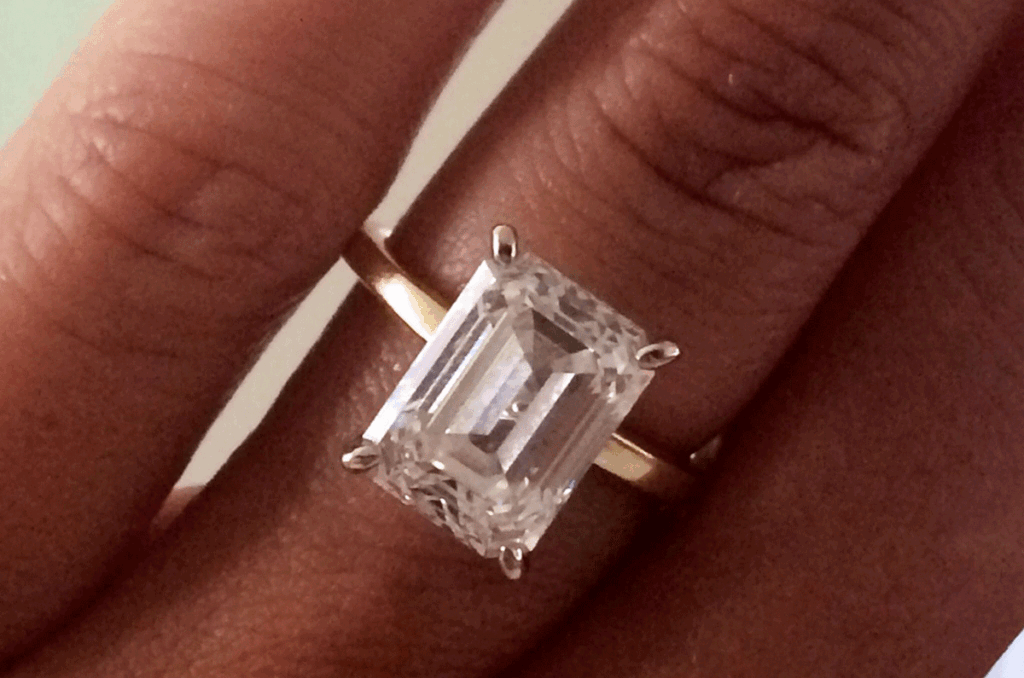 Yellow gold emerald cut engagement ring