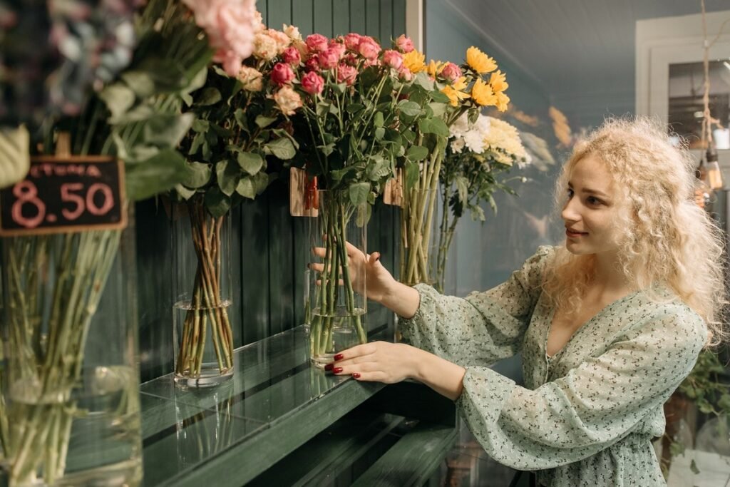 A woman arranging flowers