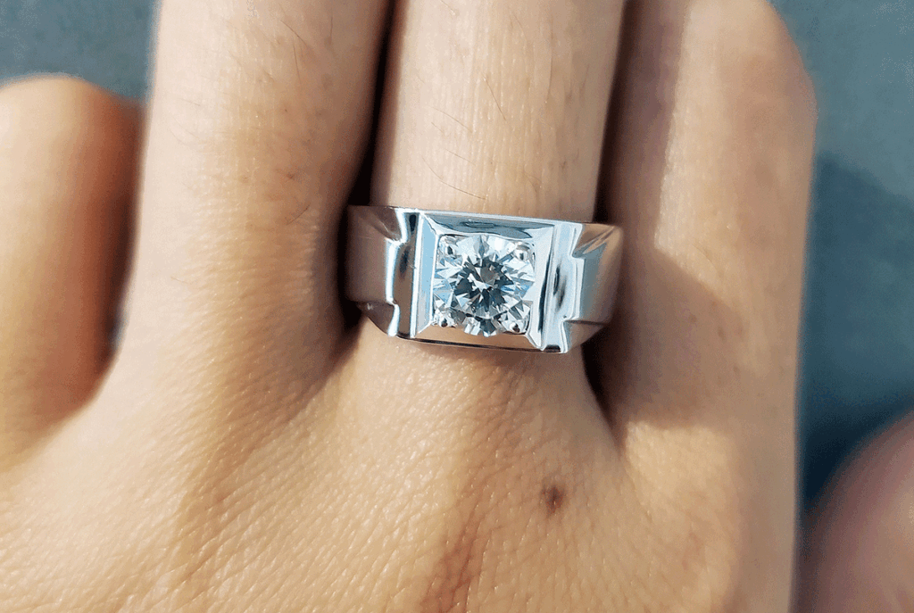 Diamond ring on a man's fingers