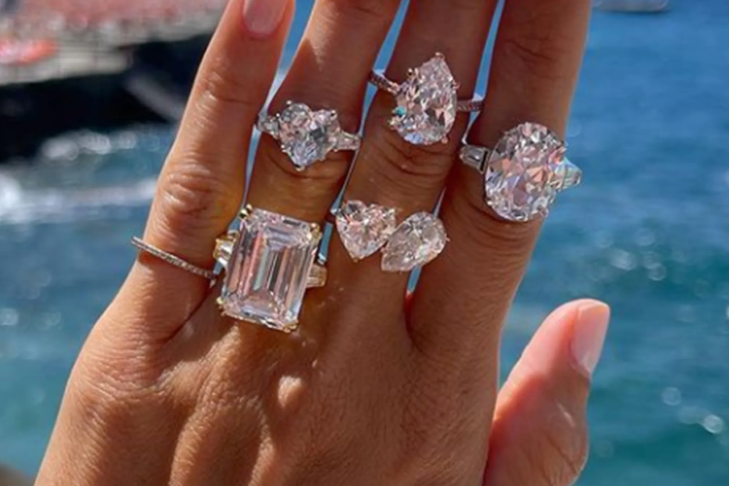 diamond rings on a woman's fingers
