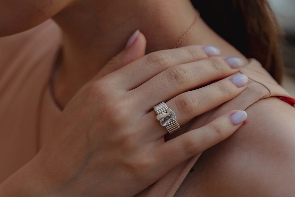 woman wearing a gold ring