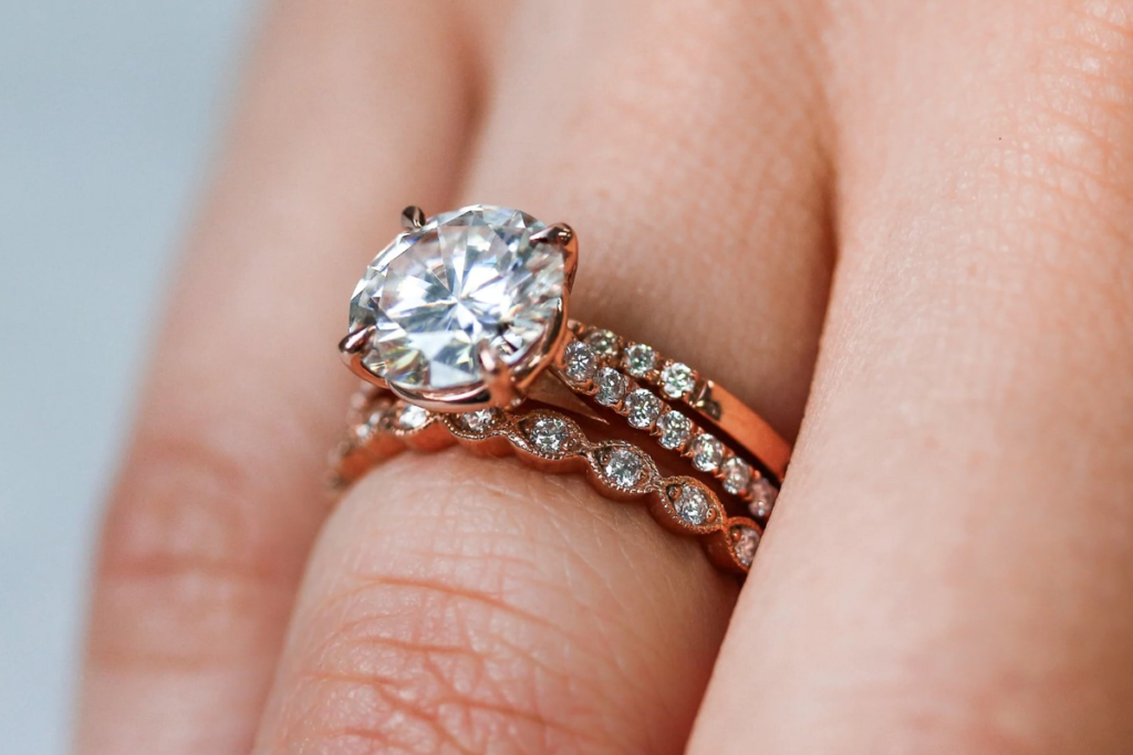 A woman wearing a cluster engagement ring