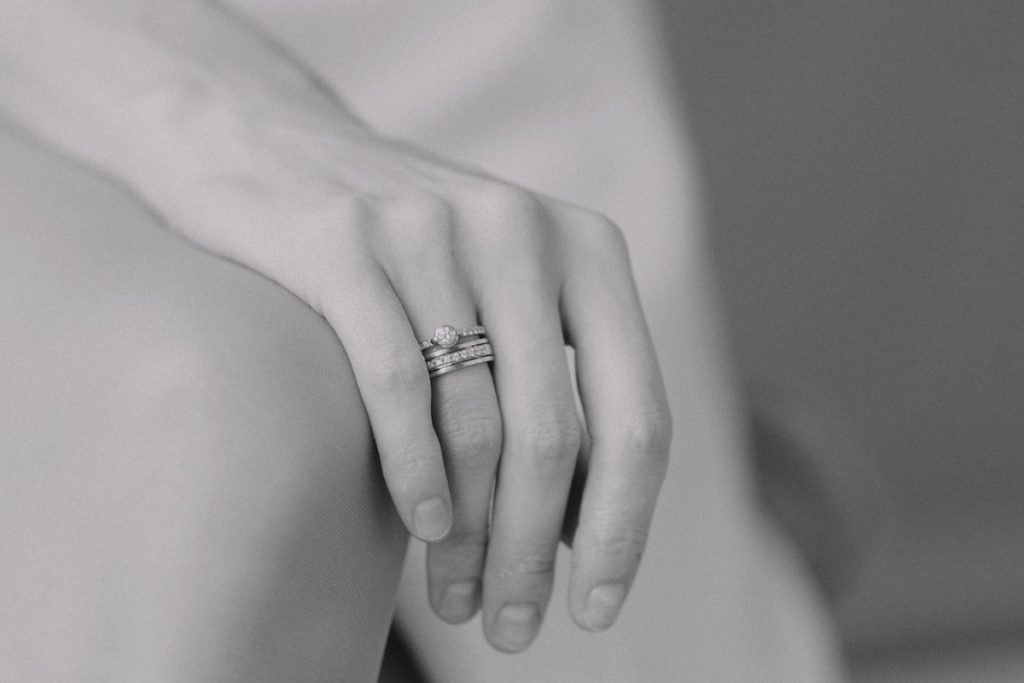 diamond ring on a finger