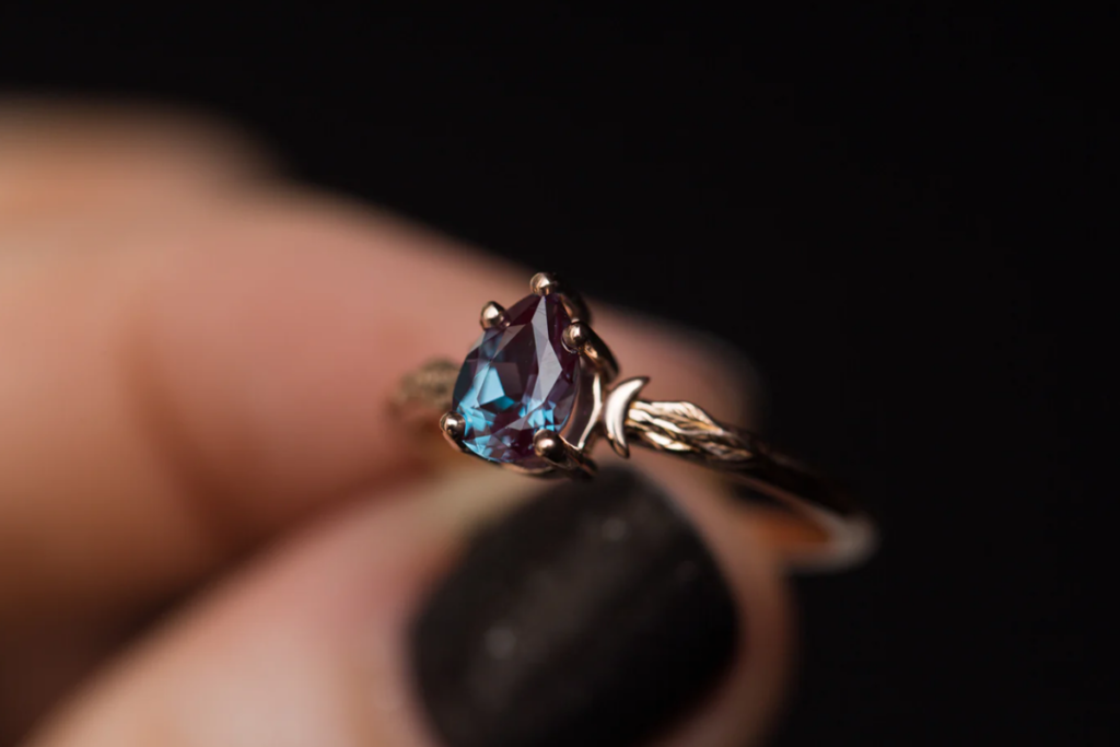 A pear alexandrite crescent moon leaf ring