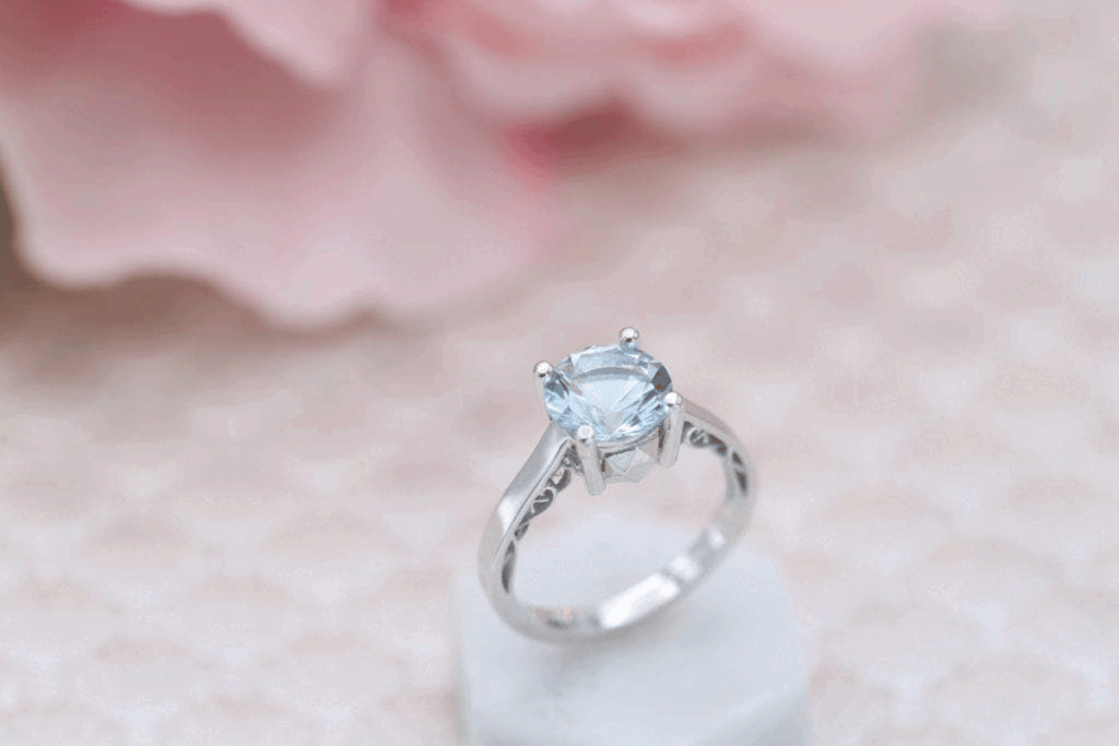 open-back aquamarine engagement ring